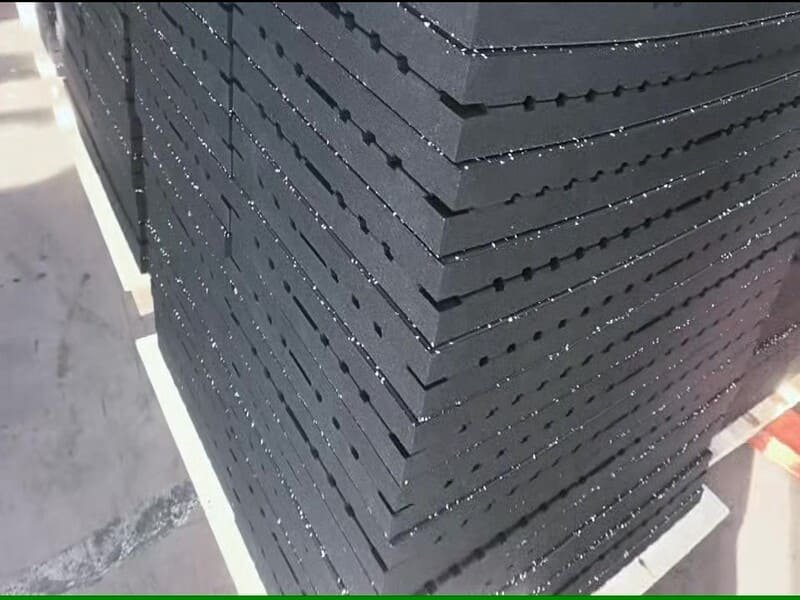applying adhesive to rubber tile